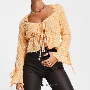 ASOS front tie blouse with flare sleeve in orange